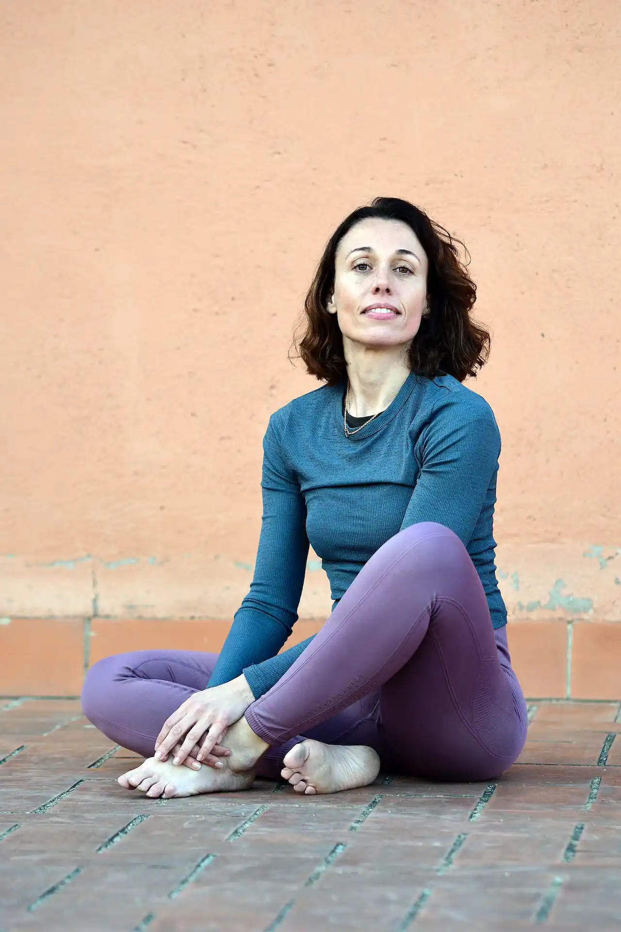 Retrat de la professora Andrea Cortijo en roba de ioga